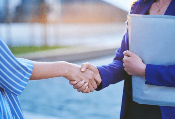 Two Business women handshack image